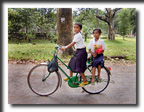 Ankor Wat, schoolgirls, bicycle, Cambodia, travel photography, photography, art prints, posters,post cards