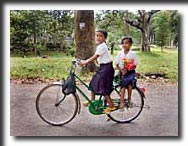Ankor Wat, schoolgirls, bicycle, Cambodia, travel photography, photography, art prints, posters, post cards